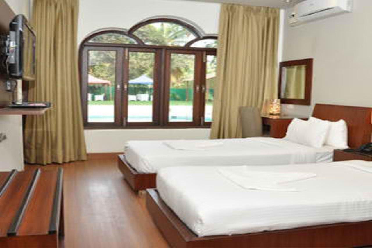 Sukhmantra Resort & Spa Candolim Bagian luar foto