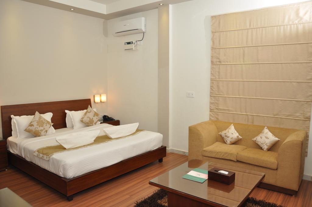 Sukhmantra Resort & Spa Candolim Ruang foto